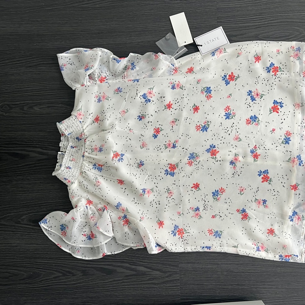 1. STATE Sleeveless Blouse